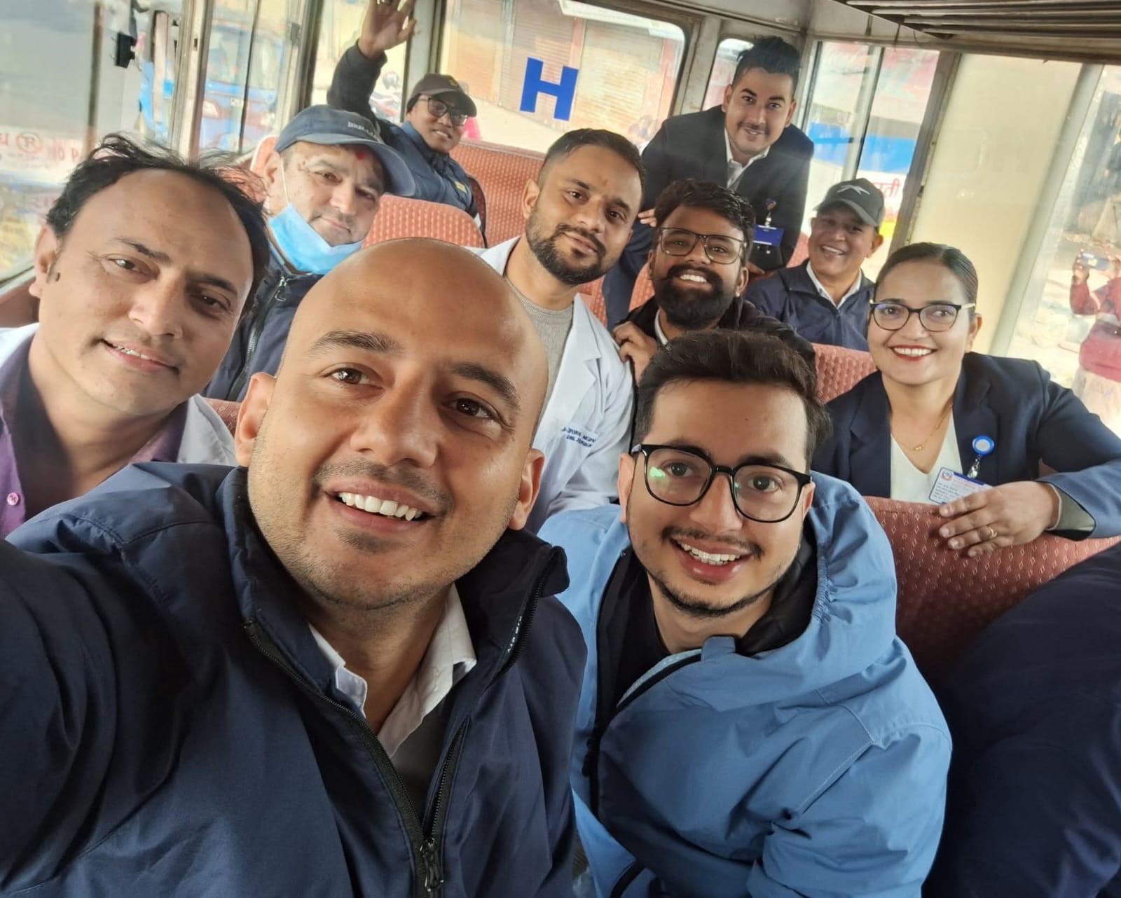 Dr. Bigyan Poudel travelling with hospital colleagues